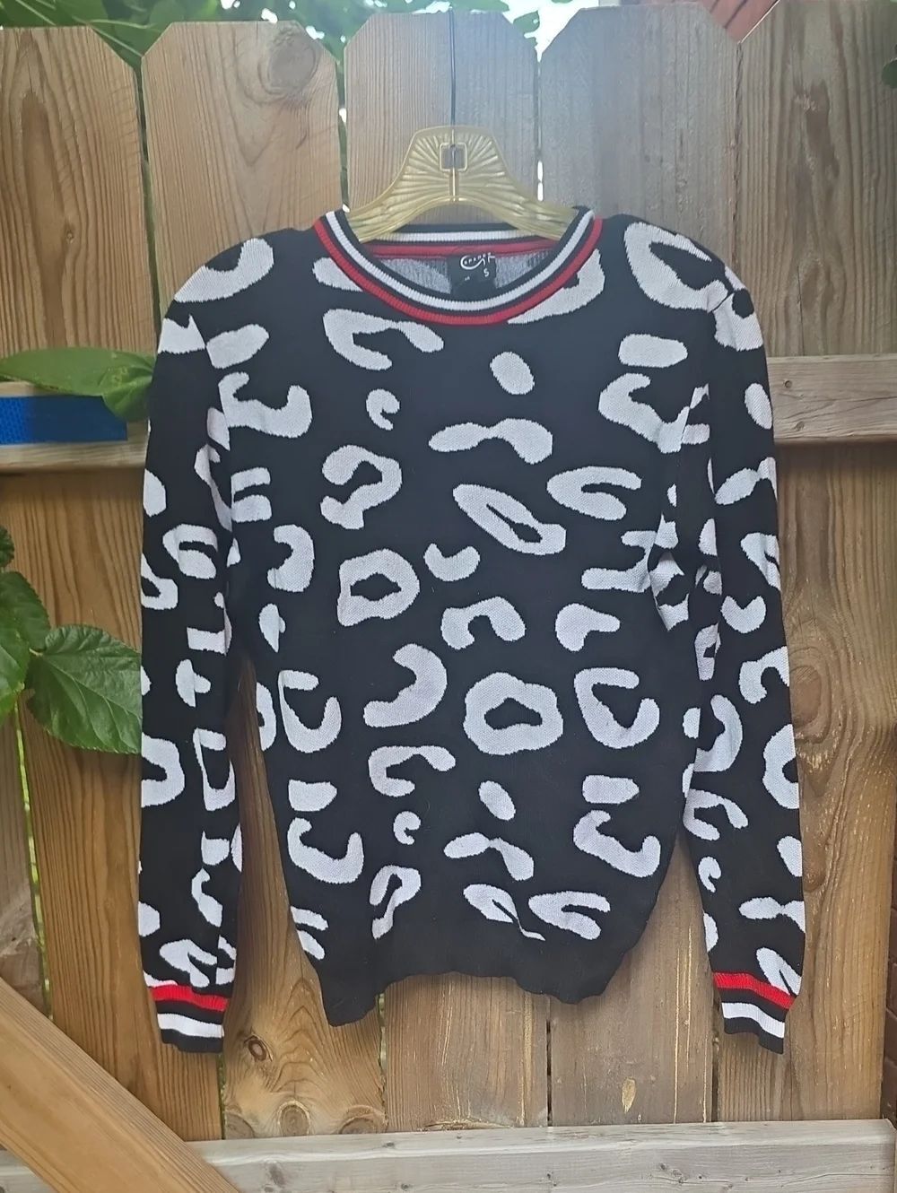 Black & White Leopard Print Crewneck Sweater with Red Trim